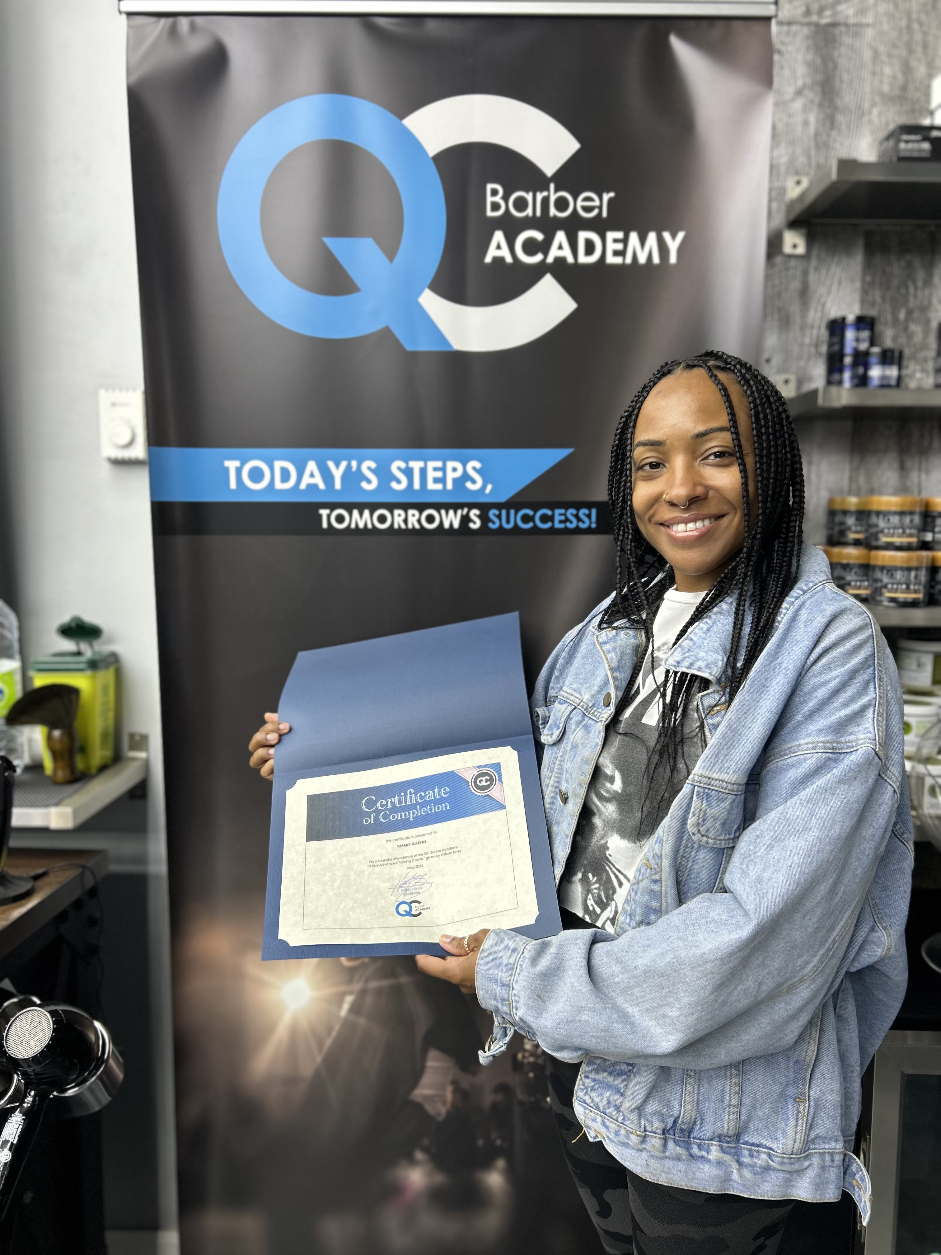 Graduate holding diploma